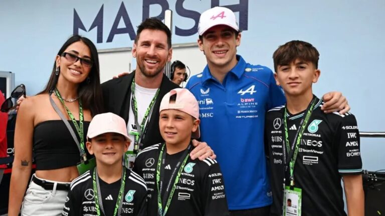 Lionel Messi y Franco Colapinto sonriendo juntos en el paddock del Gran Premio de Miami
